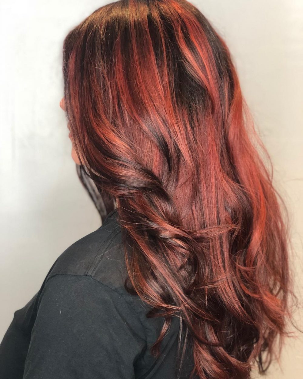 Bold Red Highlights on Dark Brown Hair