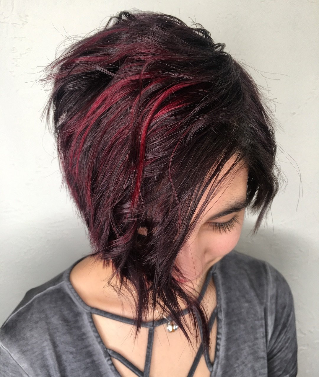 Bright Plum Hair Highlights on Dark Roots