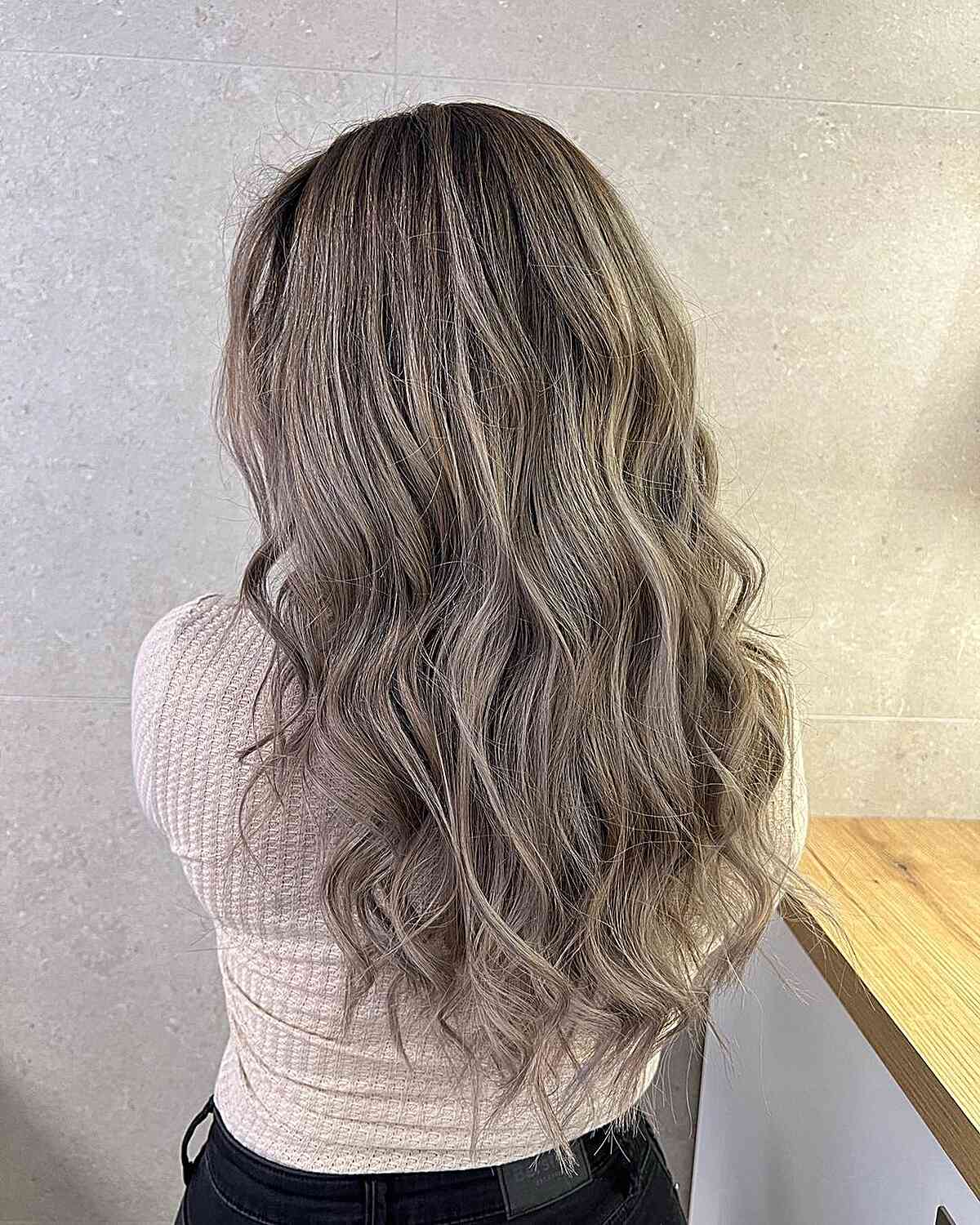 Brownish Grey Balayage with Long V-Cut Soft Waves