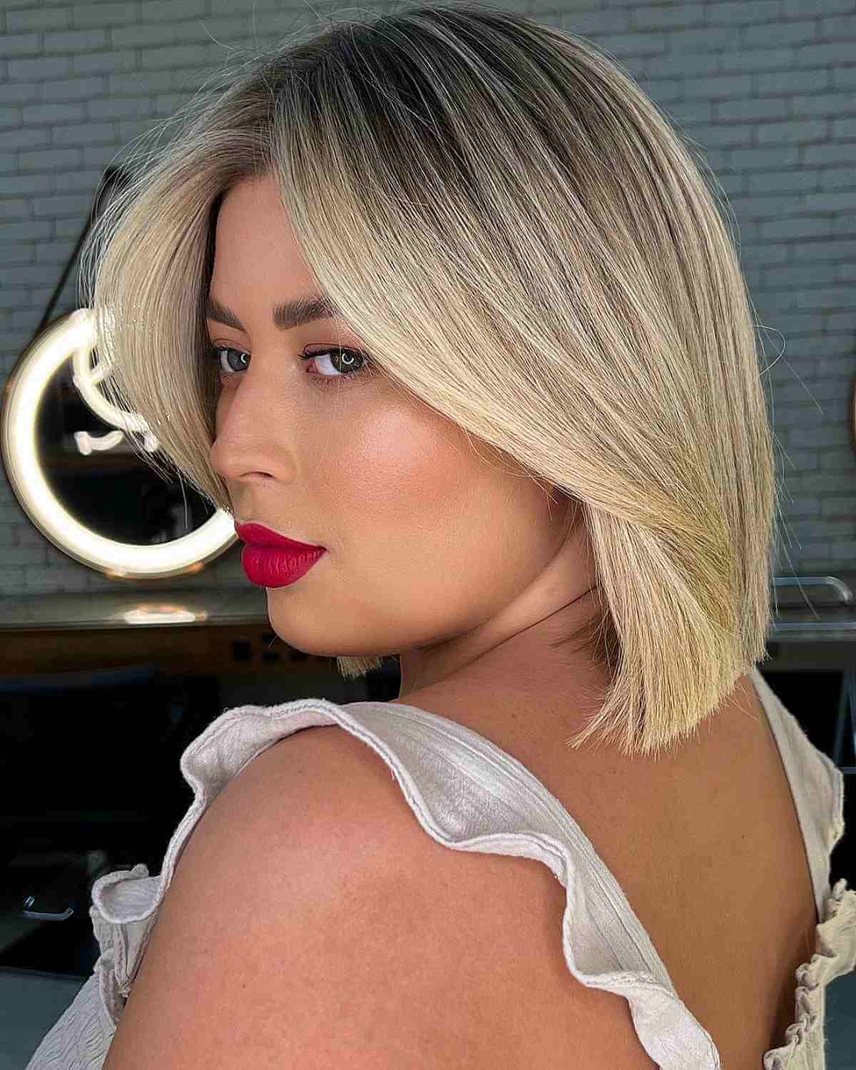 Chic Blonde Bob with Long Bangs