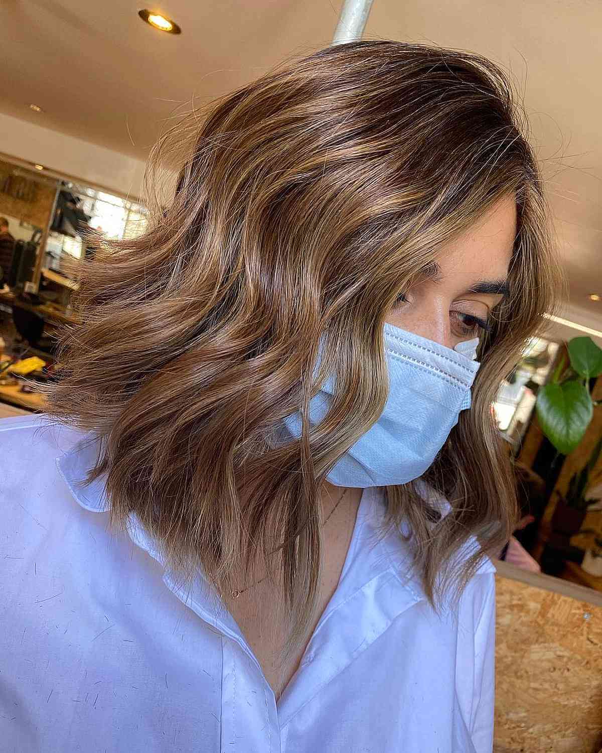 Choppy Light Brunette Lob with Caramel Highlights