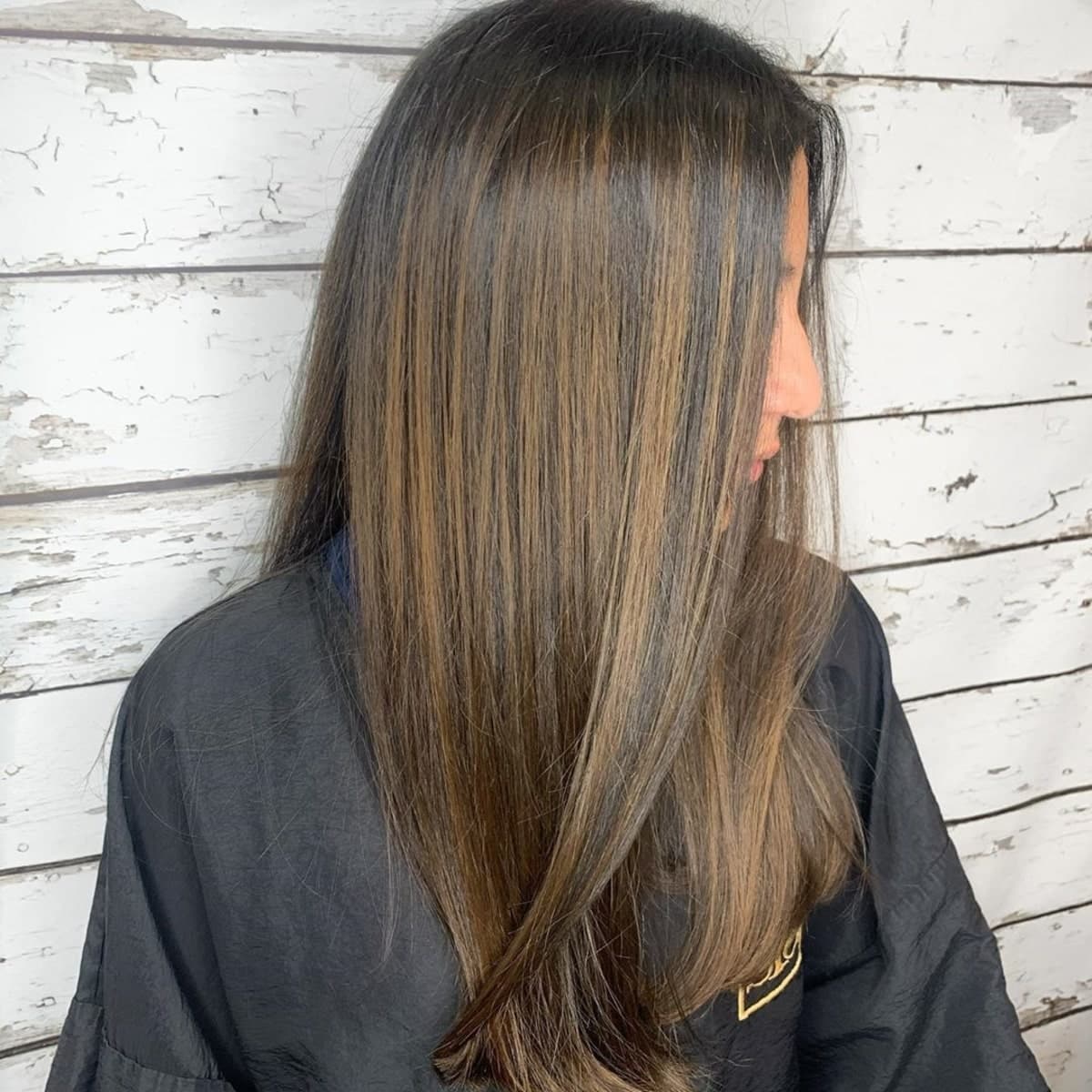 Classy caramel brown highlights on black hair