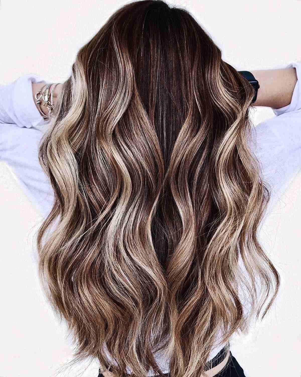 Cool-Toned Blonde Balayage Caramel Shade on Dark Brunette Hair