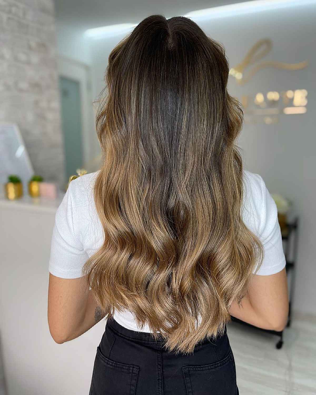 Effortless golden bronde ombre for black hair