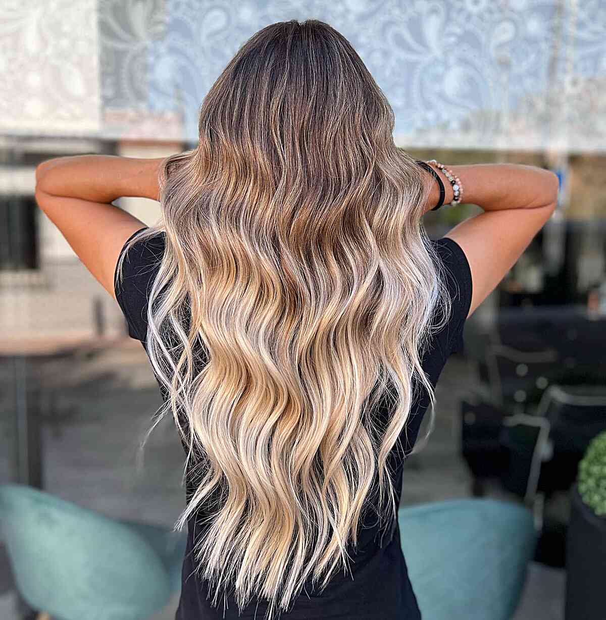 Light Brunette to Soft Blonde Ombre Tips for Long Hair with waves