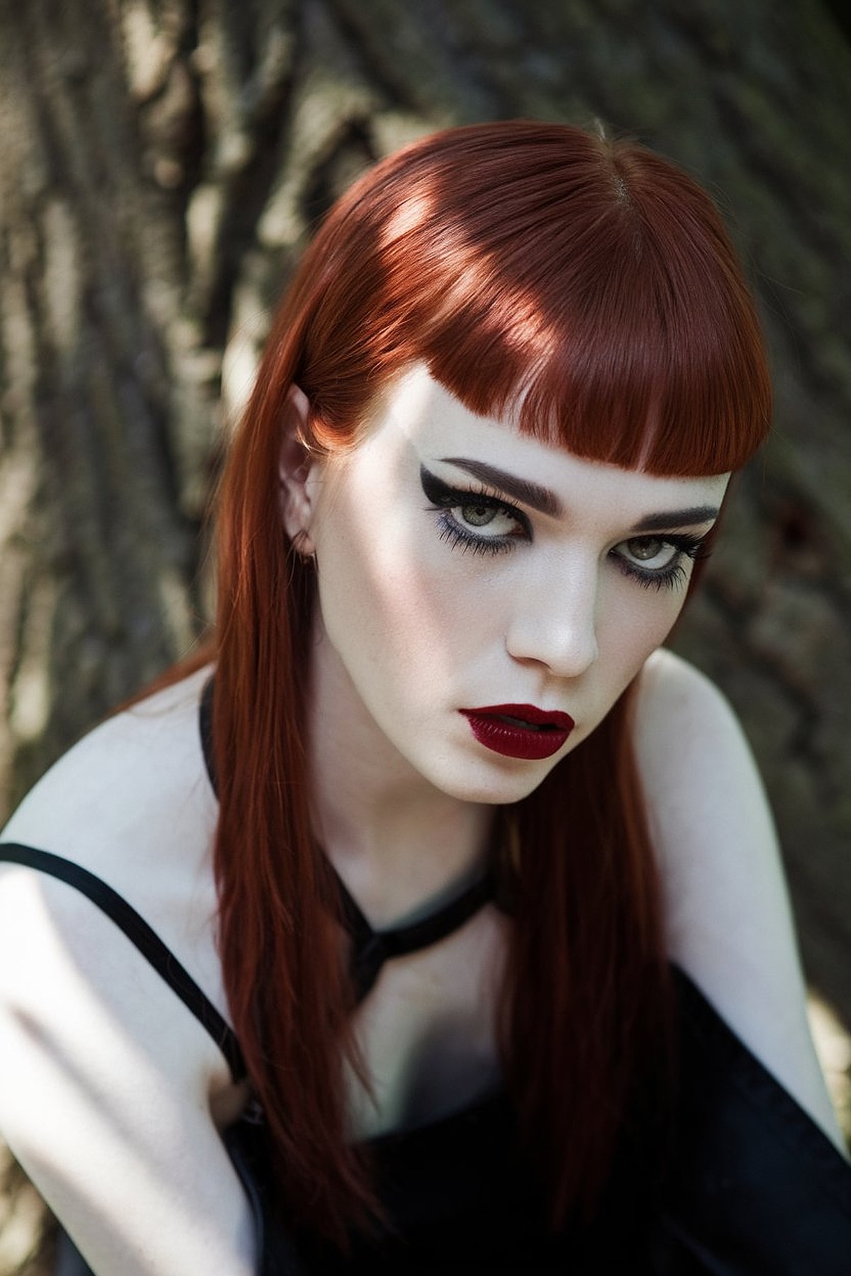 Long red hair with micro bangs for a bold Halloween look