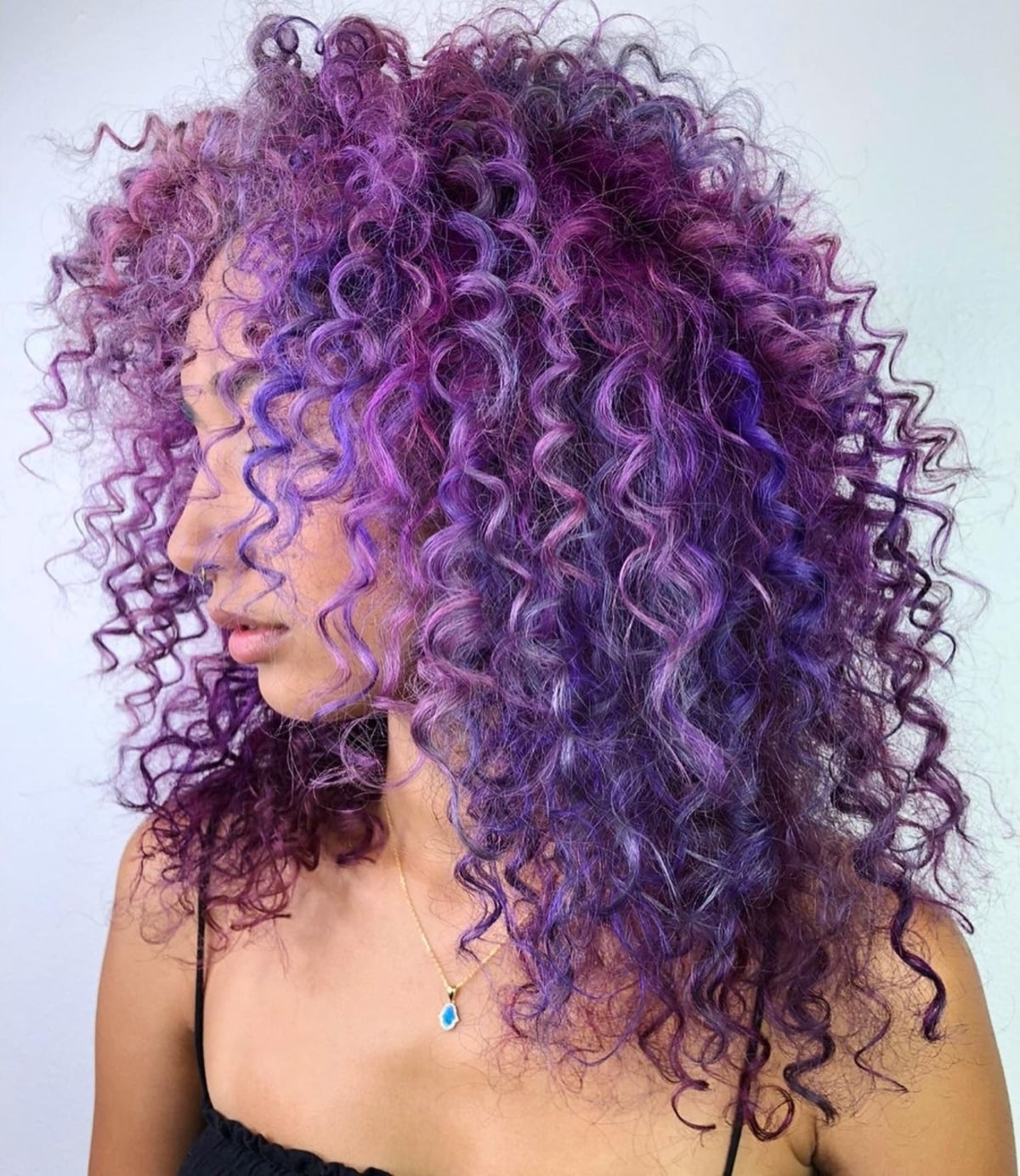 Magenta-lavender hue for curly hair