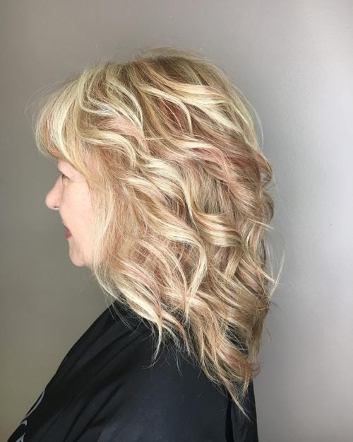 Medium-Length Blonde Hair with Red Lowlights