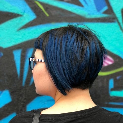 Modern bob with short bangs in blue black color