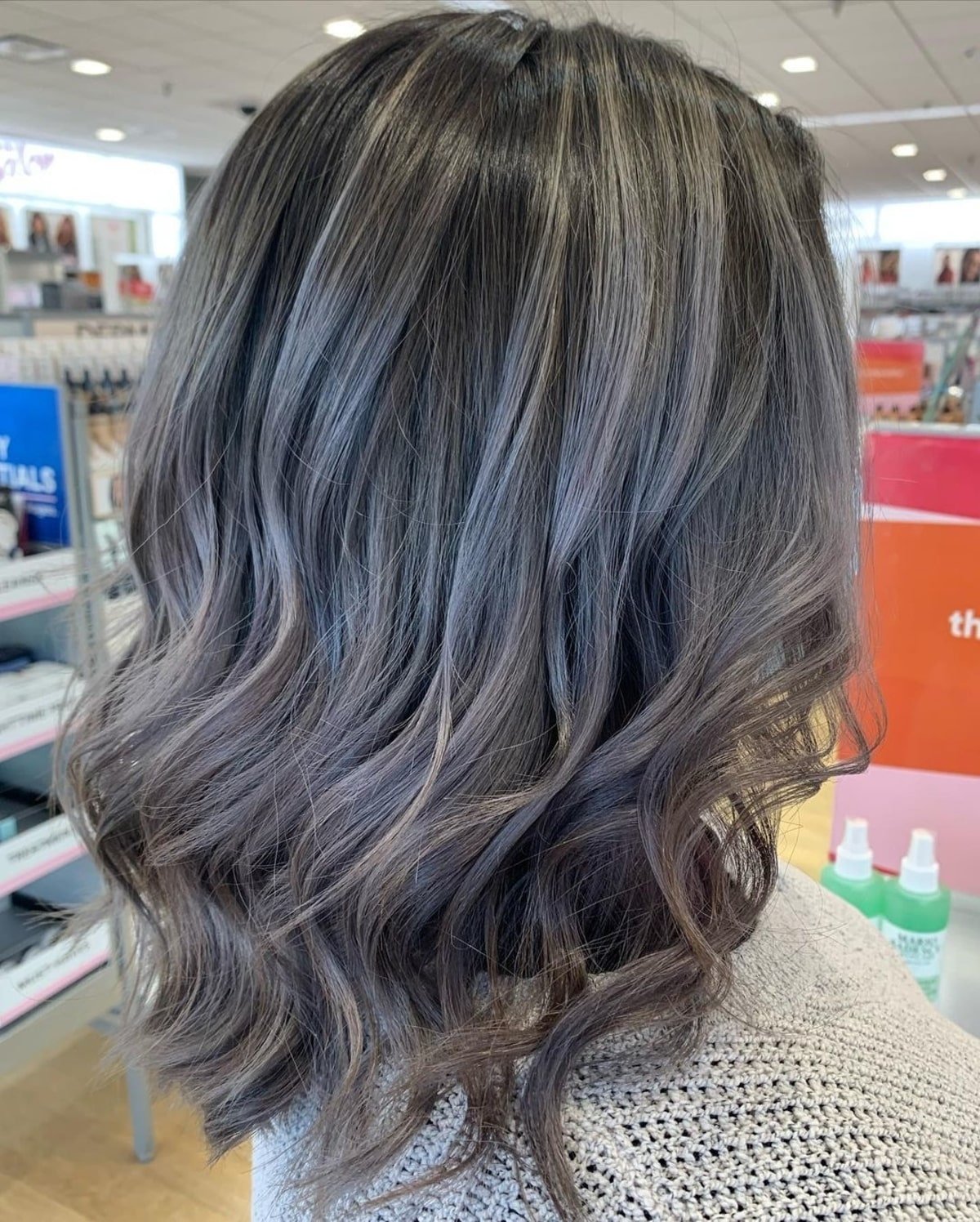 Popular dark hair with grey highlights