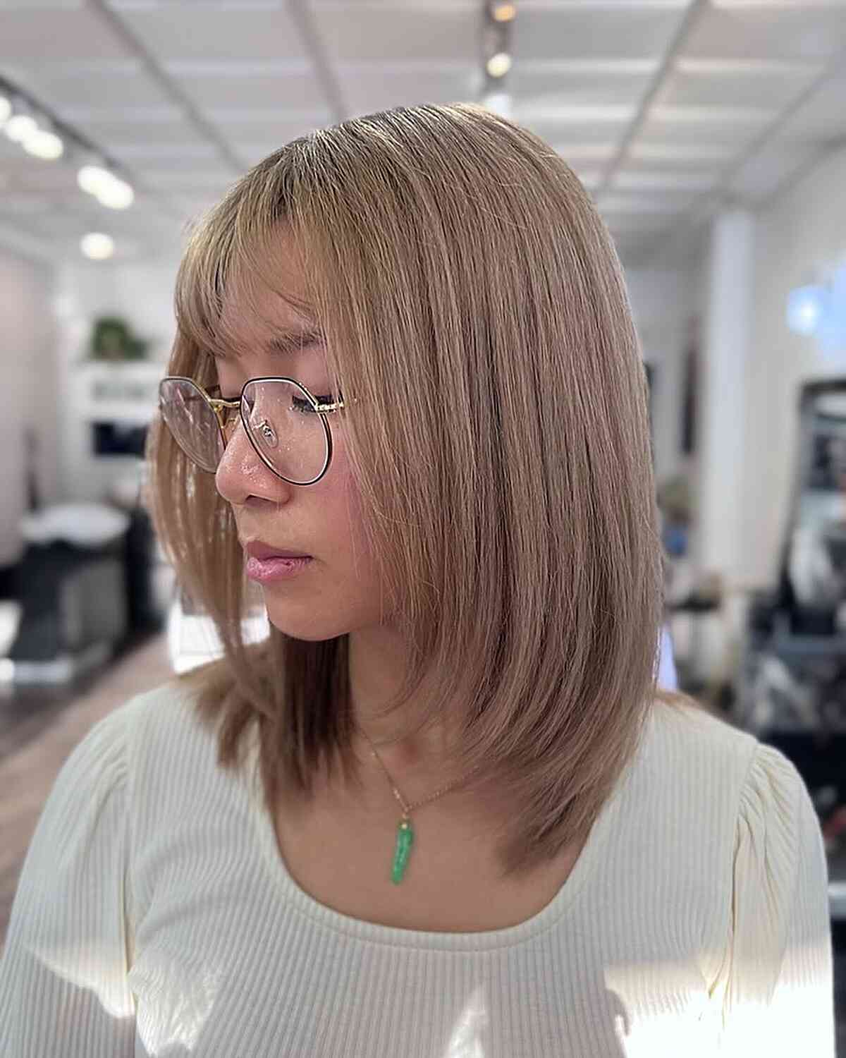 Shoulder-Length Ash Milk Tea Hair with Thin Bangs