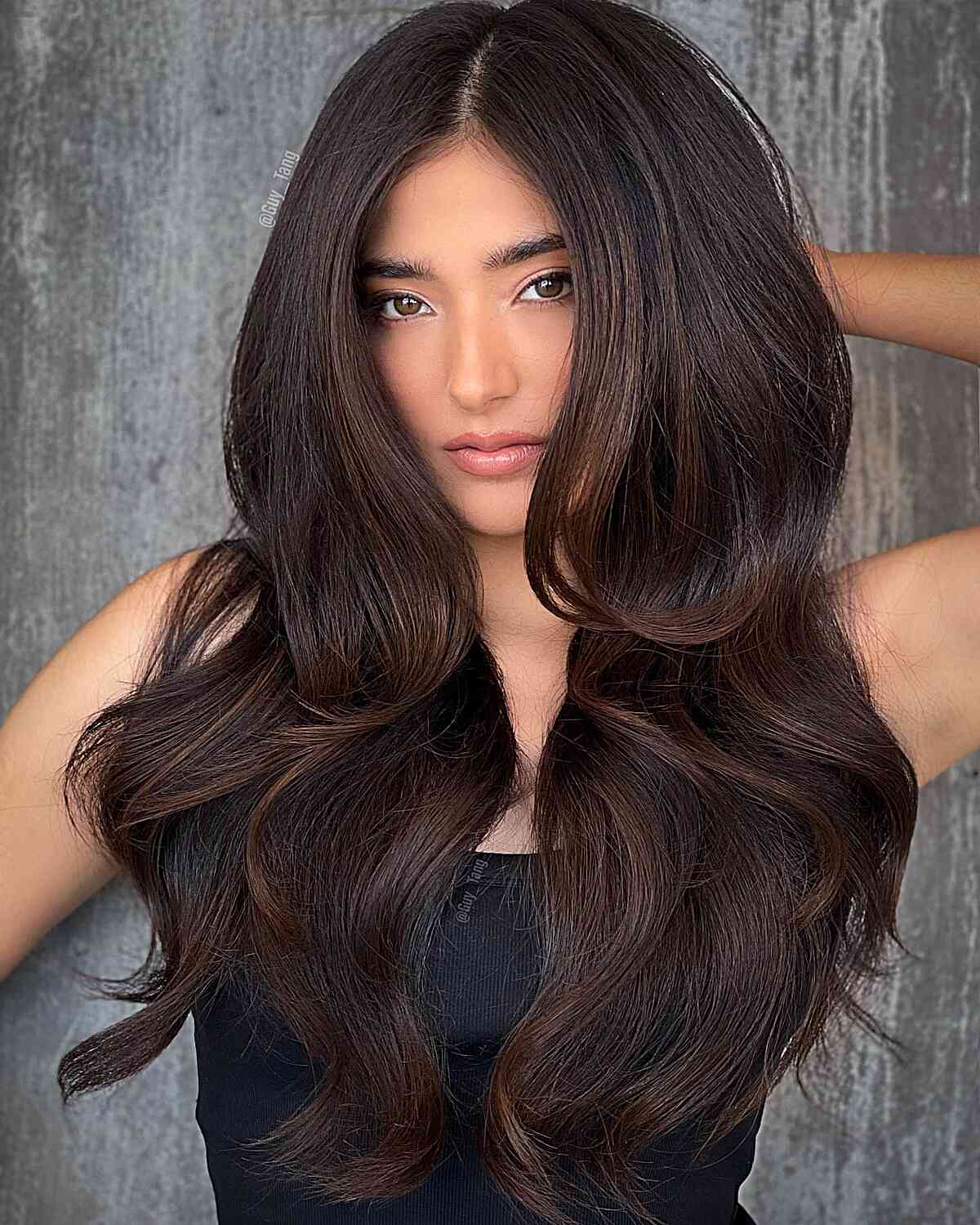 Amazing Long Thick Dark Brunette Hair with Highlights and a middle part for ladies