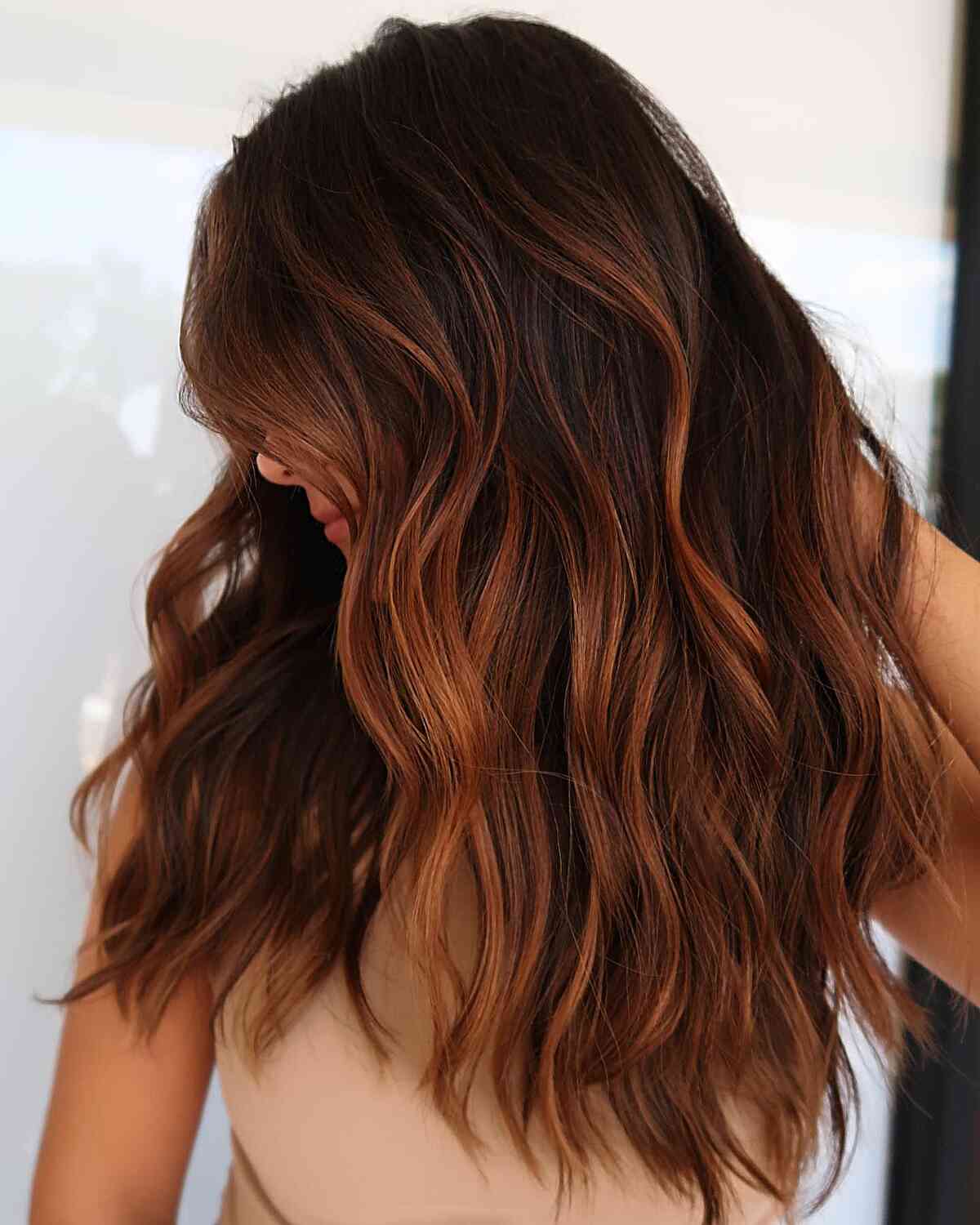 Auburn Cinnamon Balayage Highlights on Long Wavy Brunette Hair