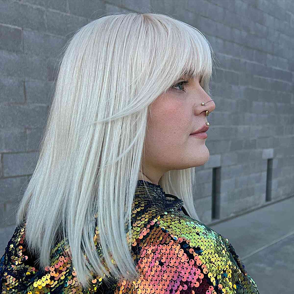 Blunt Mid-Length Platinum Cut with Fringe and Layers