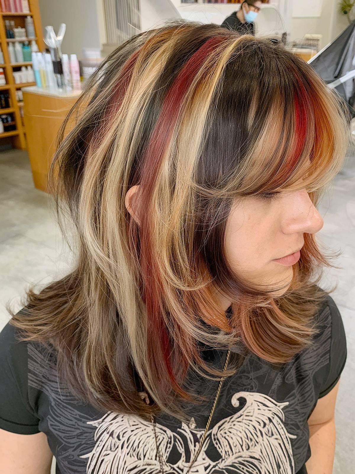 Calico color on natural curly hair with blonde and copper