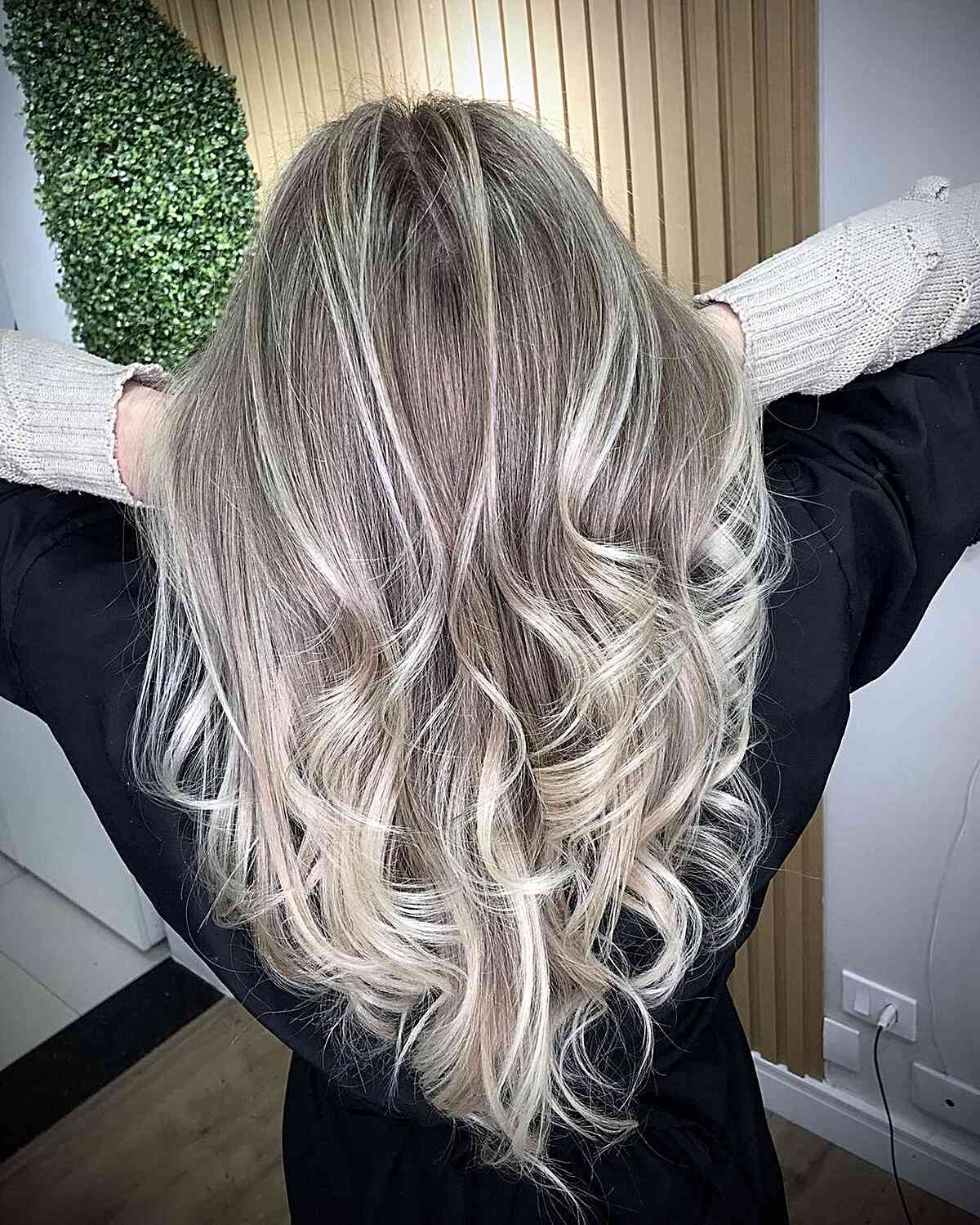 Contrasting Platinum Highlights on Dark Blonde Hair