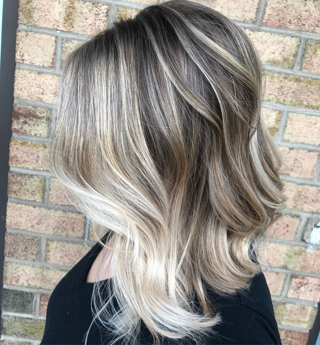 dark brown hair with platinum blonde highlights