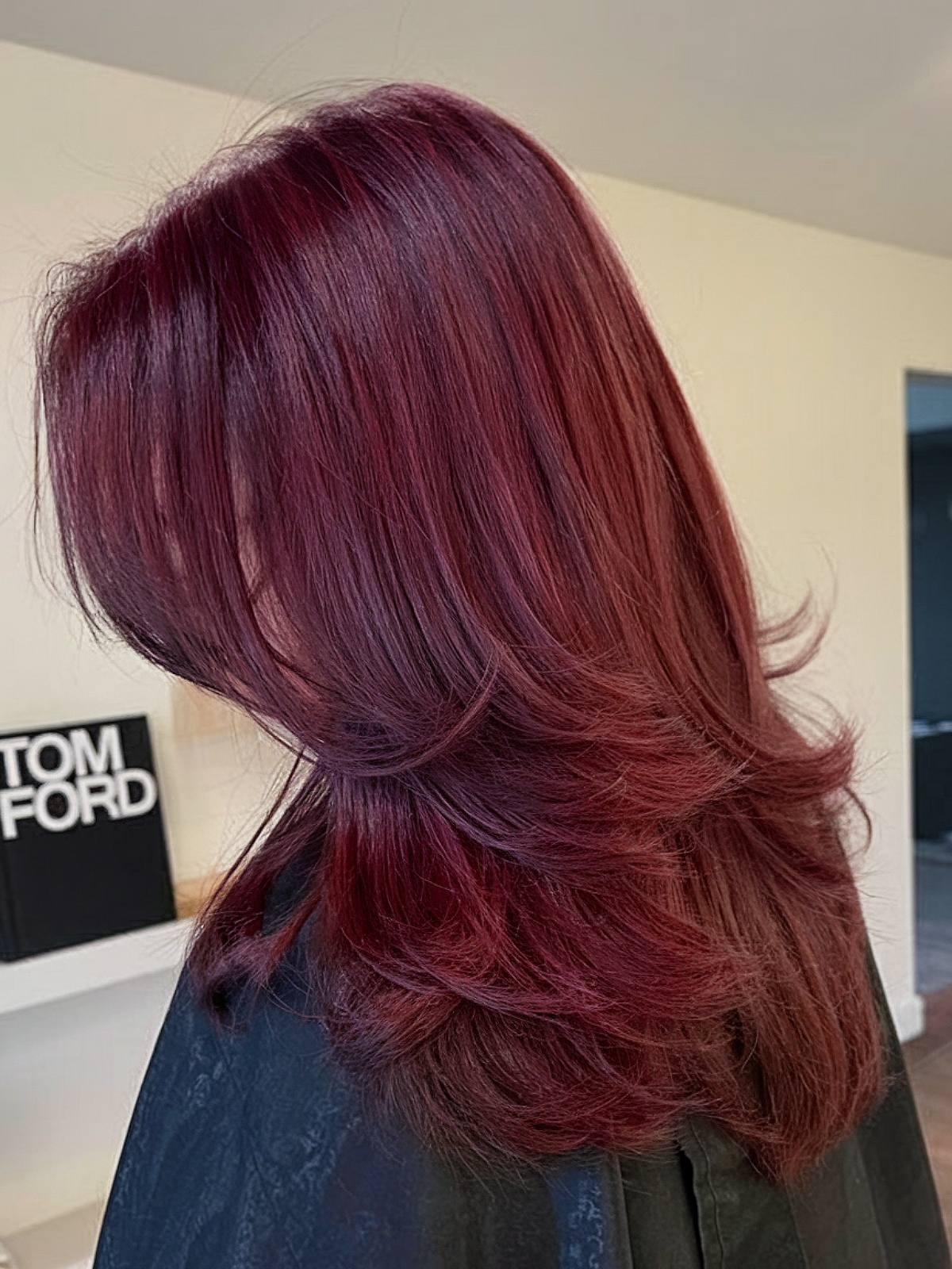 Dark red wine tone on layered haircut