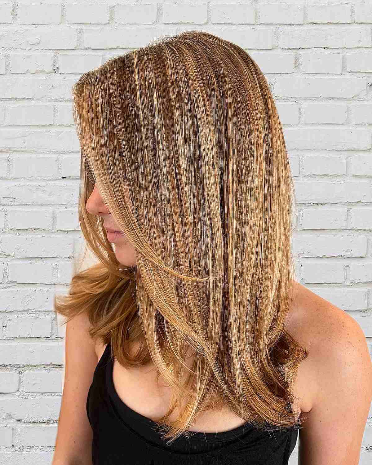 Dimensional Honey Blonde Color on Straight Layered Hair