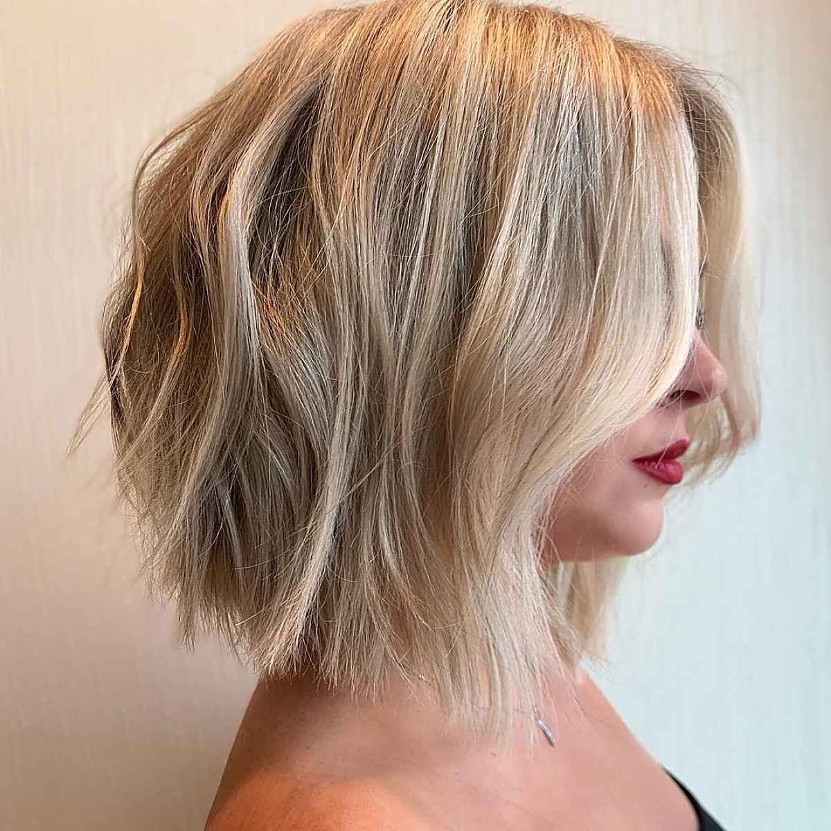 Dimensional Textured soft blonde lob cut