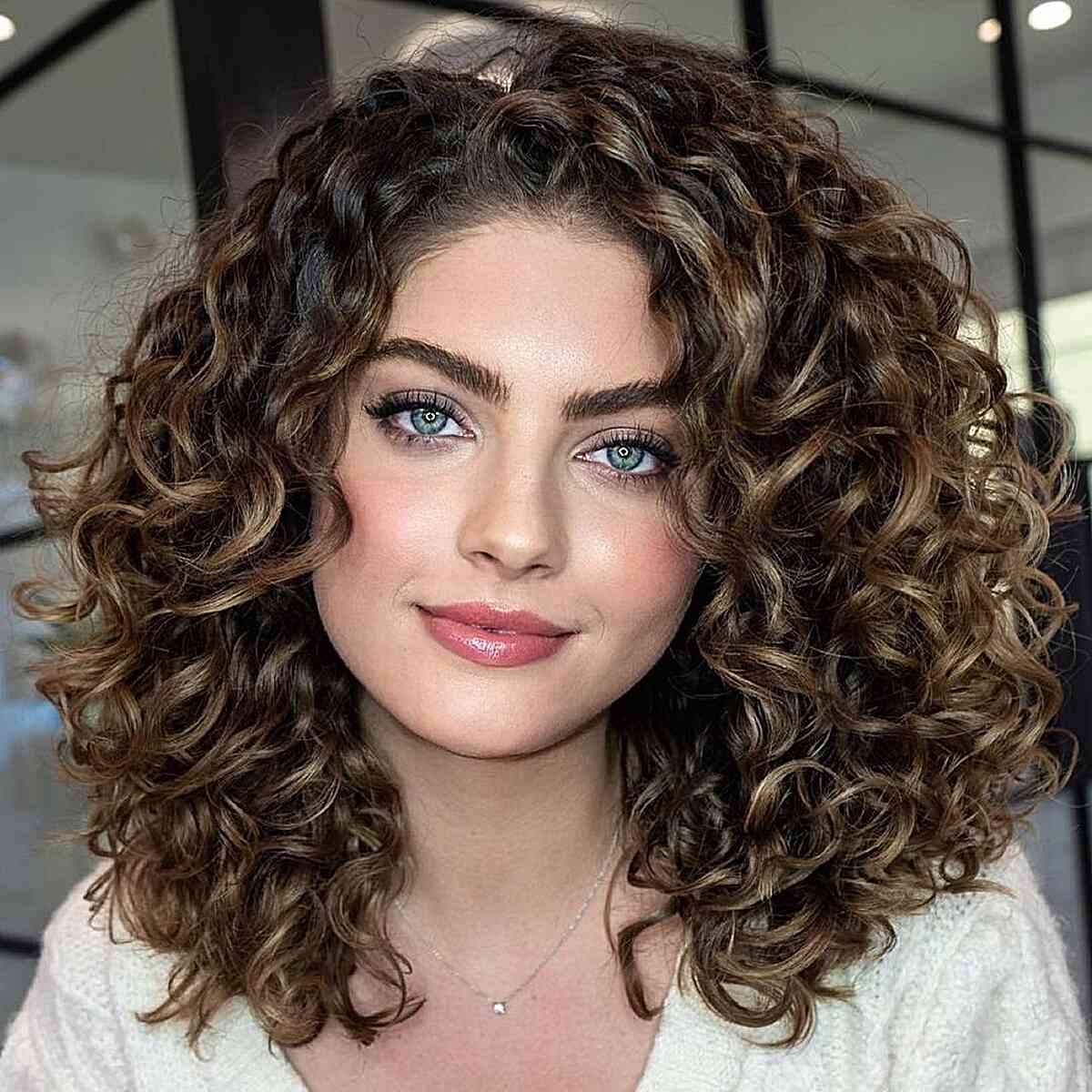 Effortless Dimensional Dark Brown Highlighted Curls