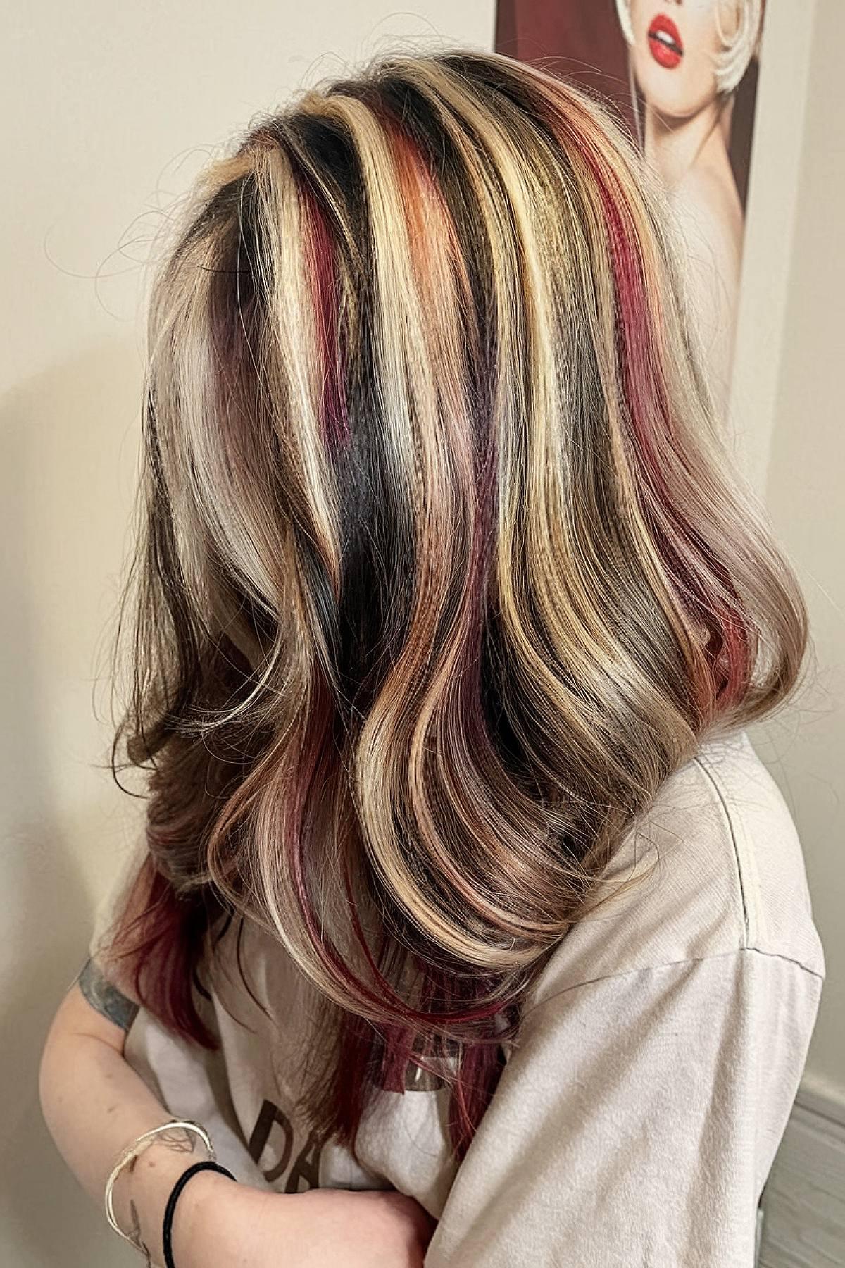 Faded calico hair color with red and blonde tones