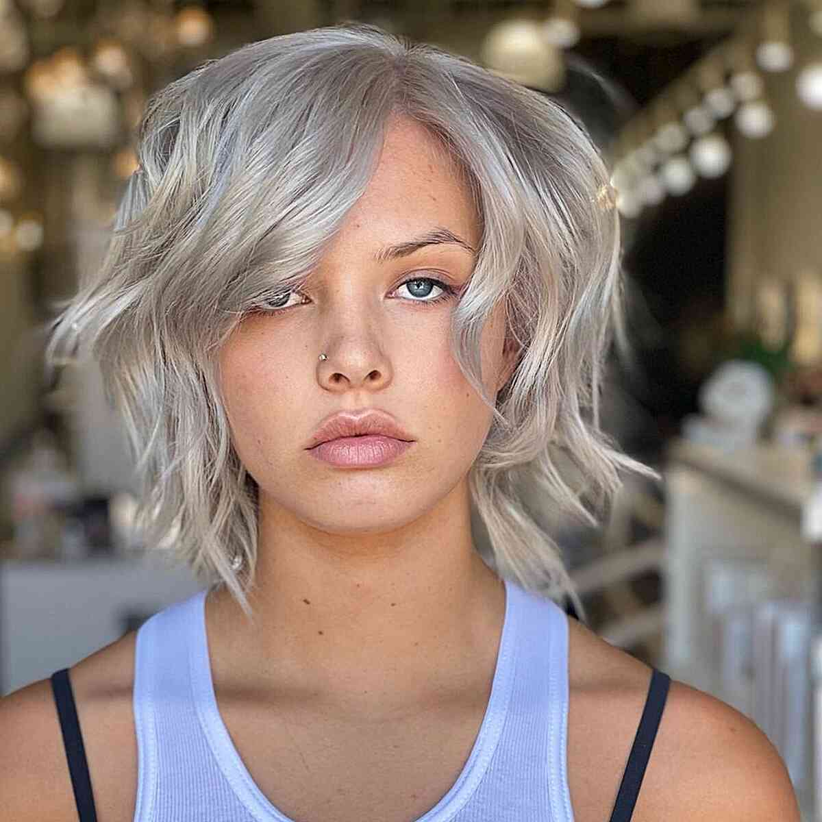 Icy Grey on Tousled Short Hair with Side Bangs and Choppy Layers