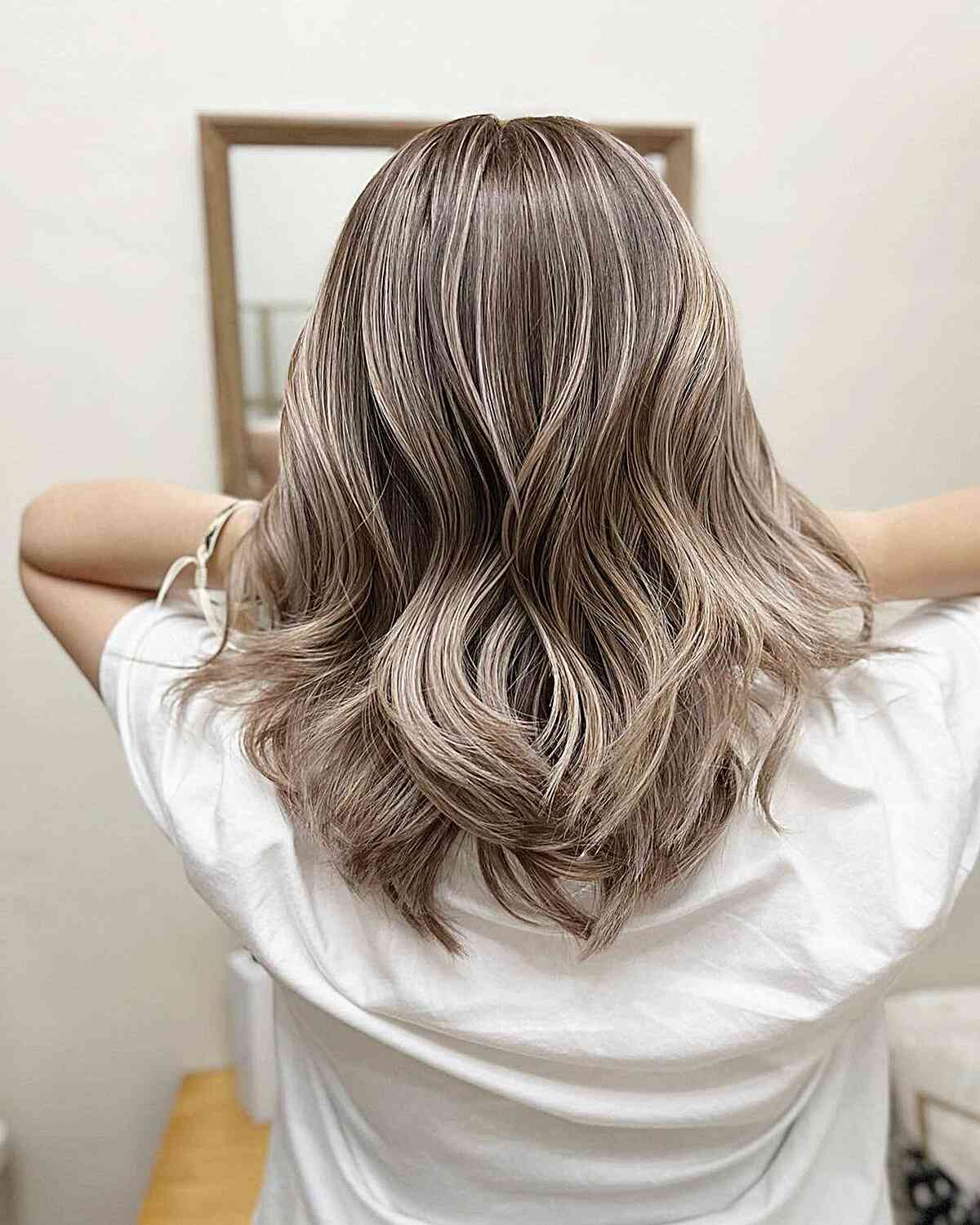 Light Ash Blonde Balayage on Medium V-Cut Layered Hair