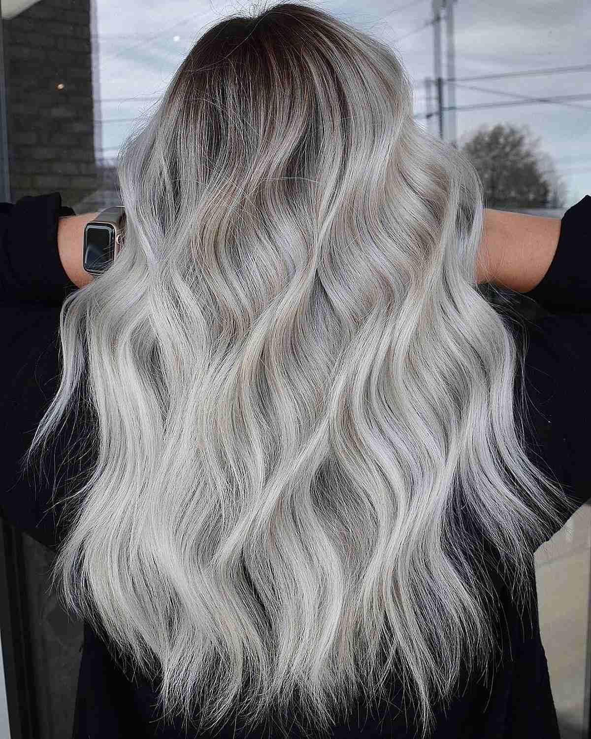 Light icy blonde with dark roots hairstyle