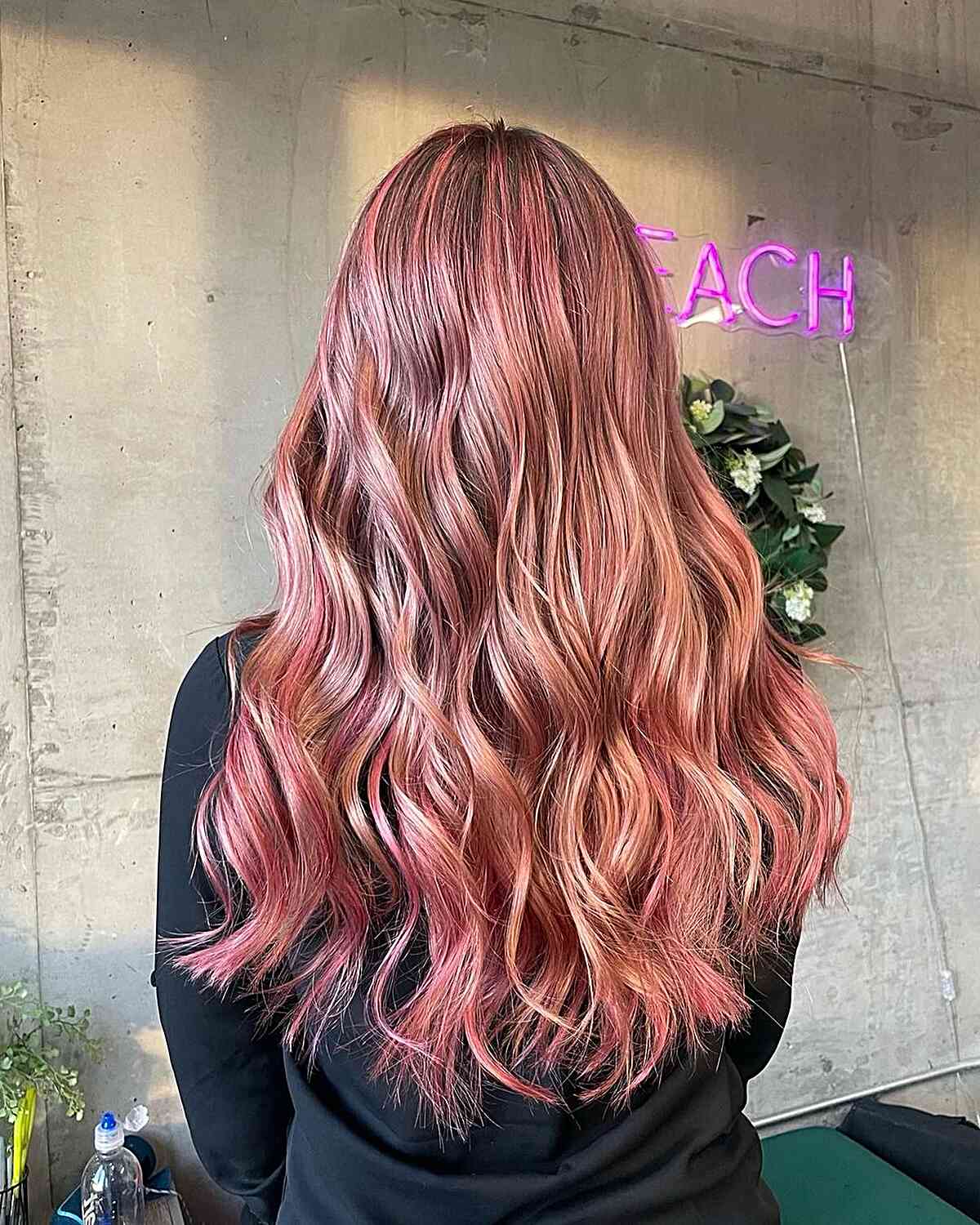 Long Waves with Multi-Dimensional Rose Gold Tones and Darker Roots