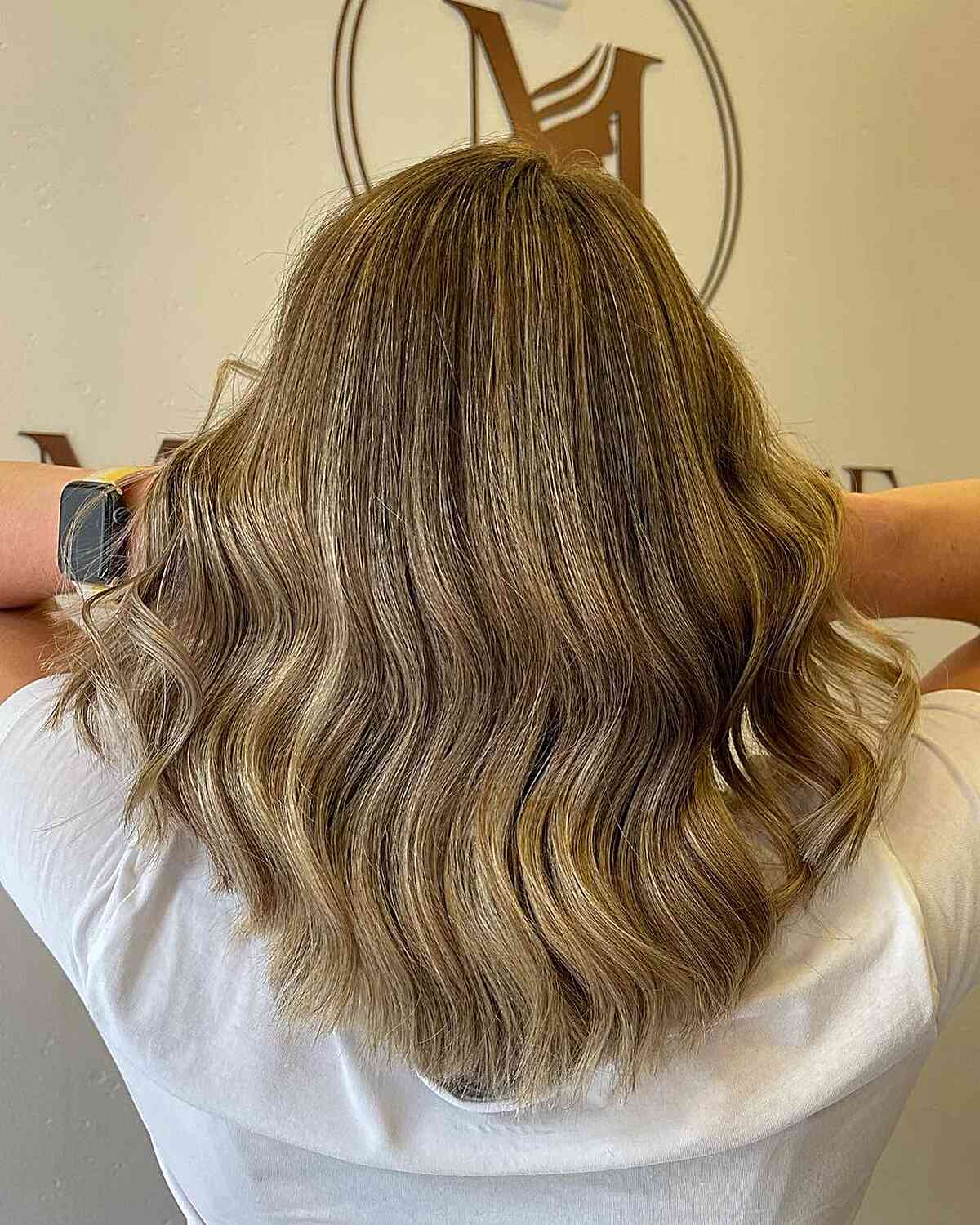 Medium Layered U-Cut with Subtle Honey Balayage Tones