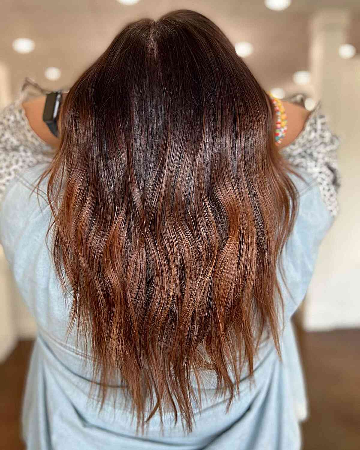 Muted Auburn Ombre Balayage on Long-Length Dark Brown Hair