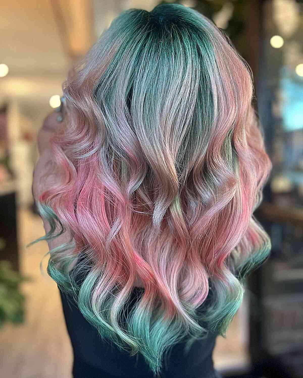 Pinks and Greens with Dark Roots Hair Color Idea