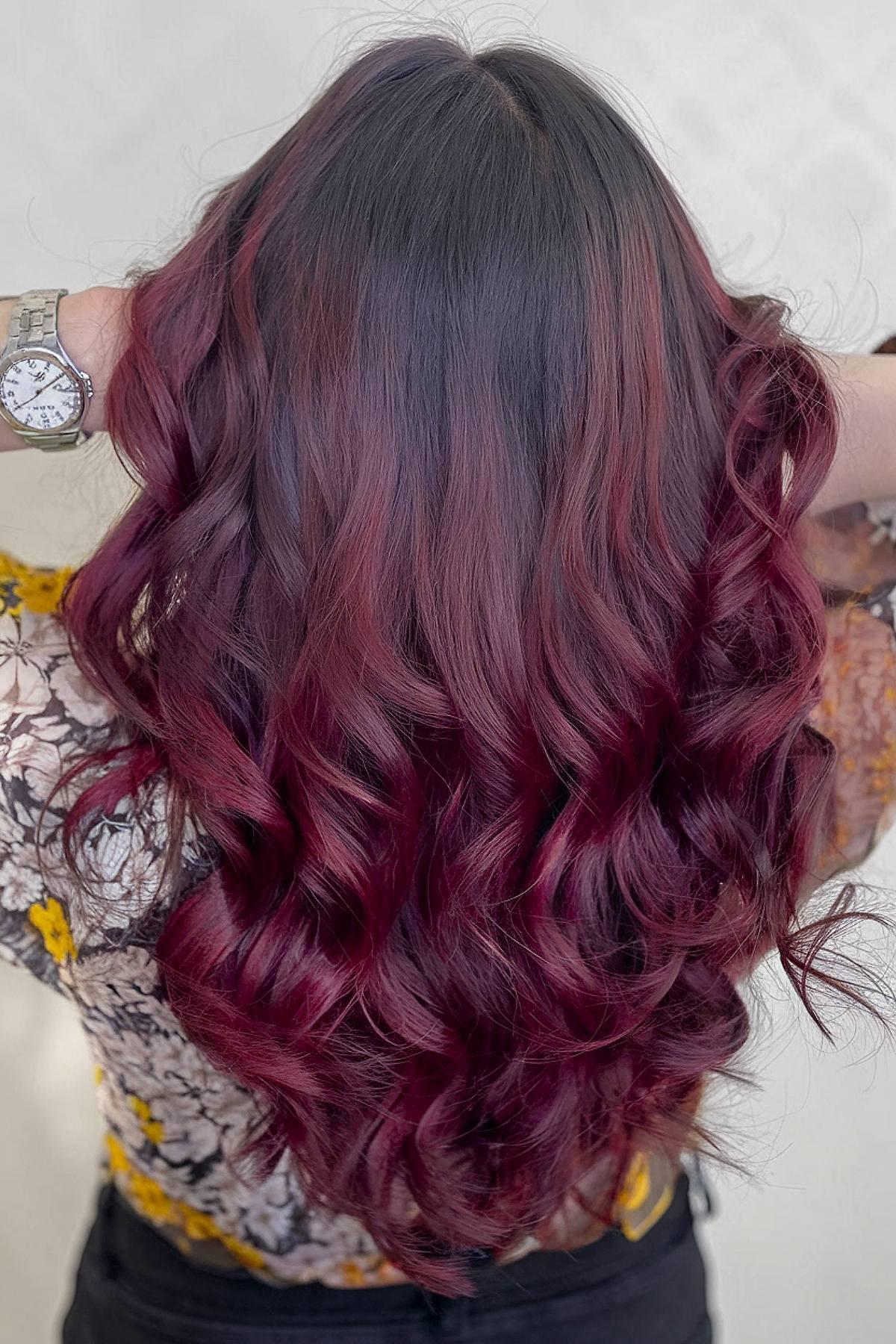 Red wine ombre on dark brown wavy hair