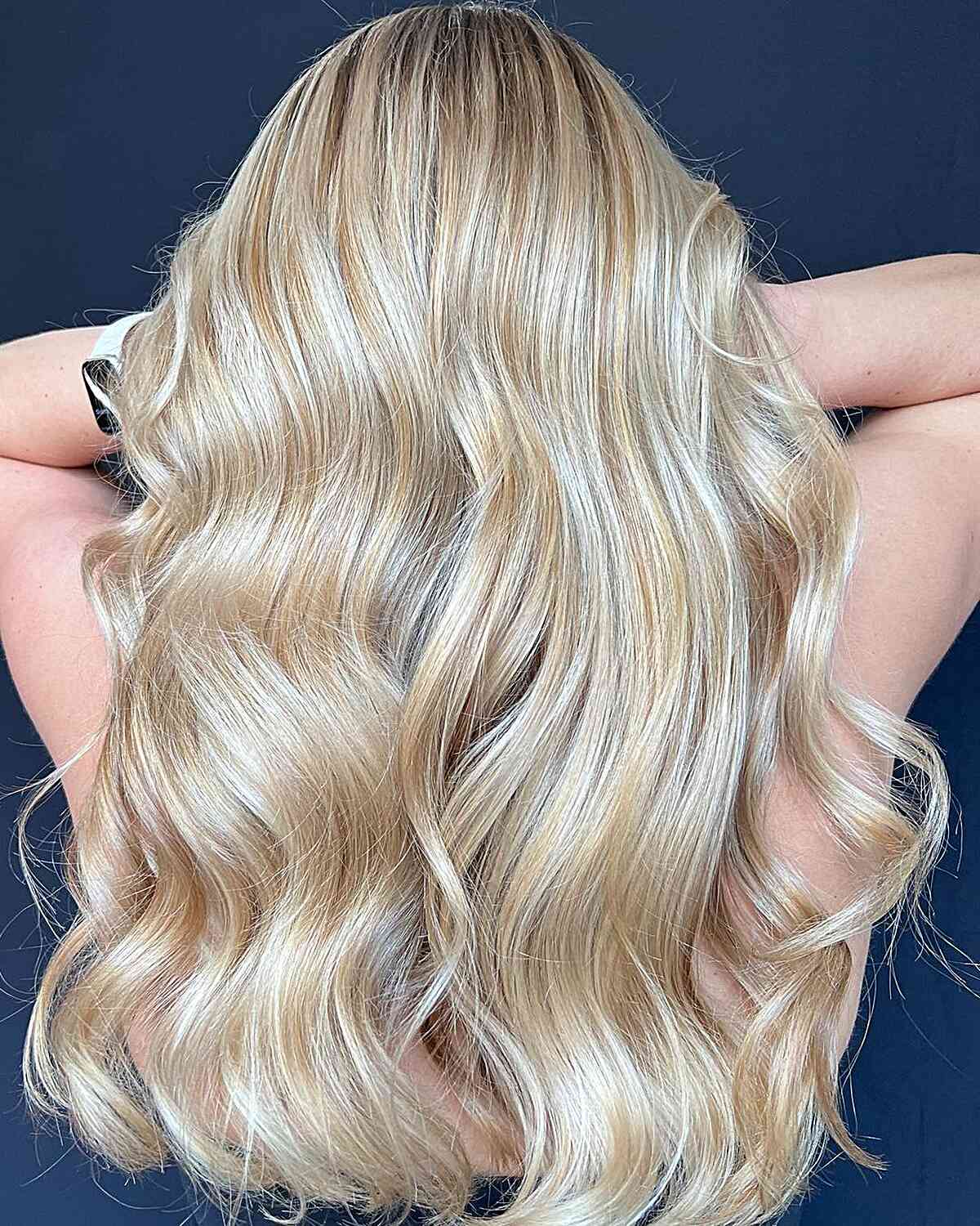 Rich Wavy Vanilla Blonde with Long Haircut