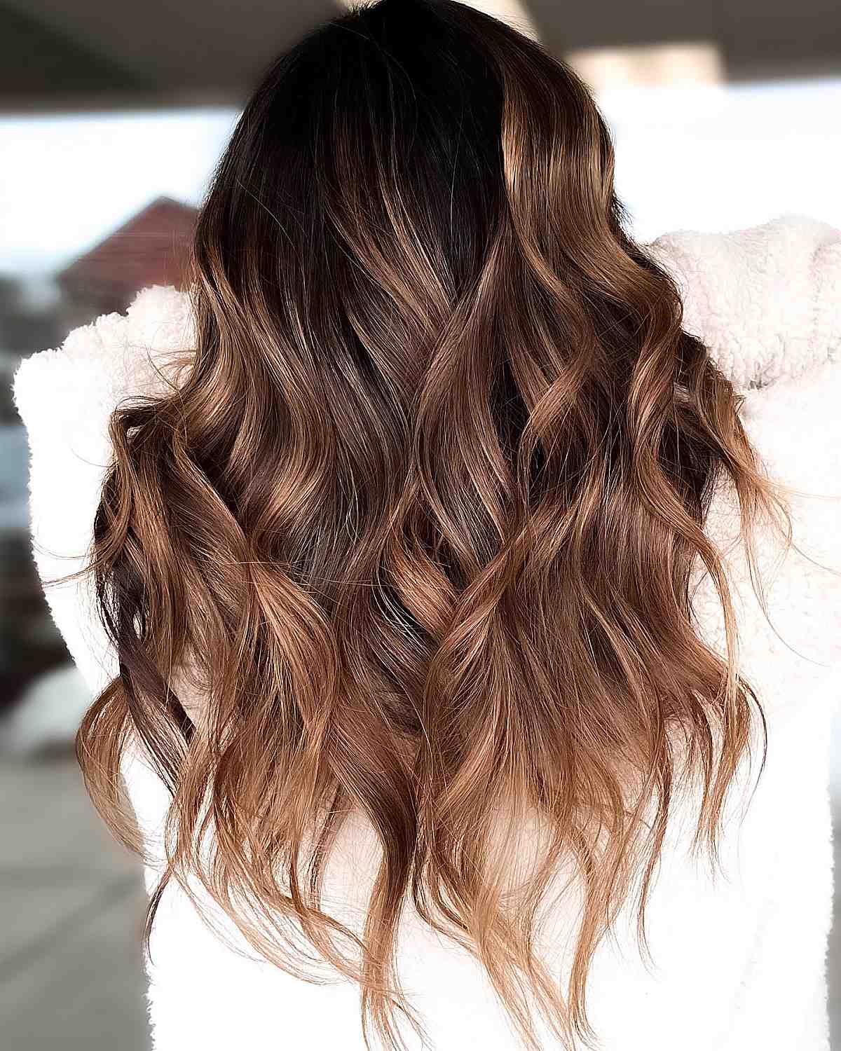 Sexy dark brown hair with caramel highlights