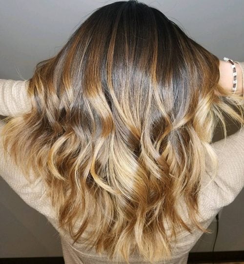 Sunning wavy ash honey blonde hair color