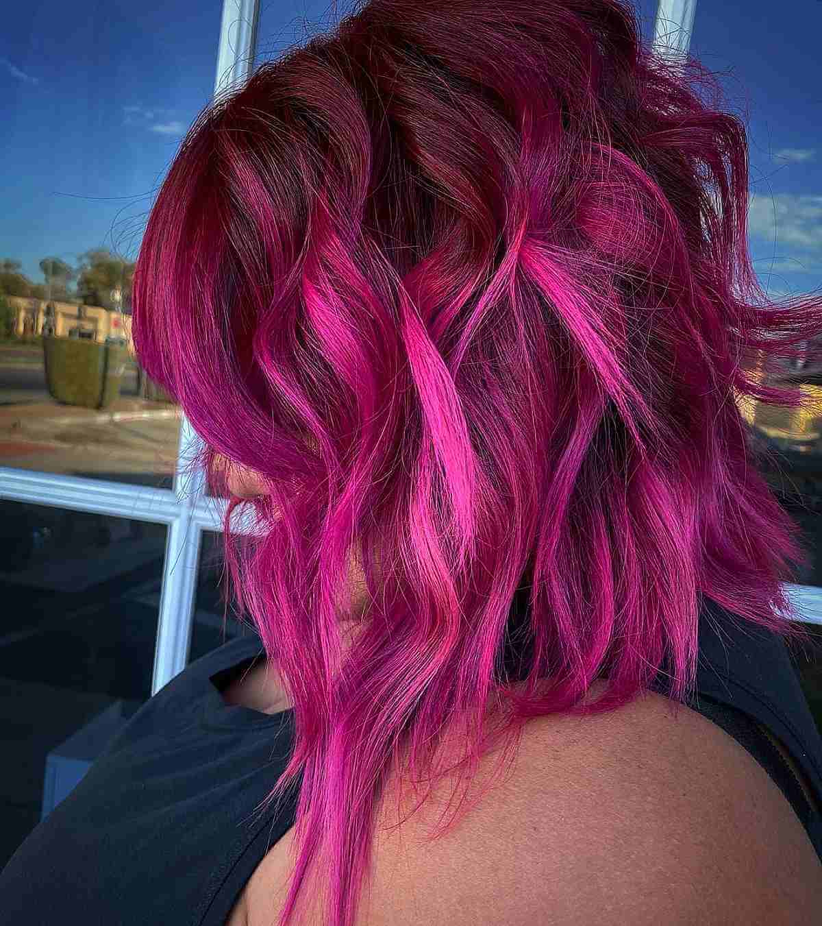 Tousled Magenta-Red Bob Cut