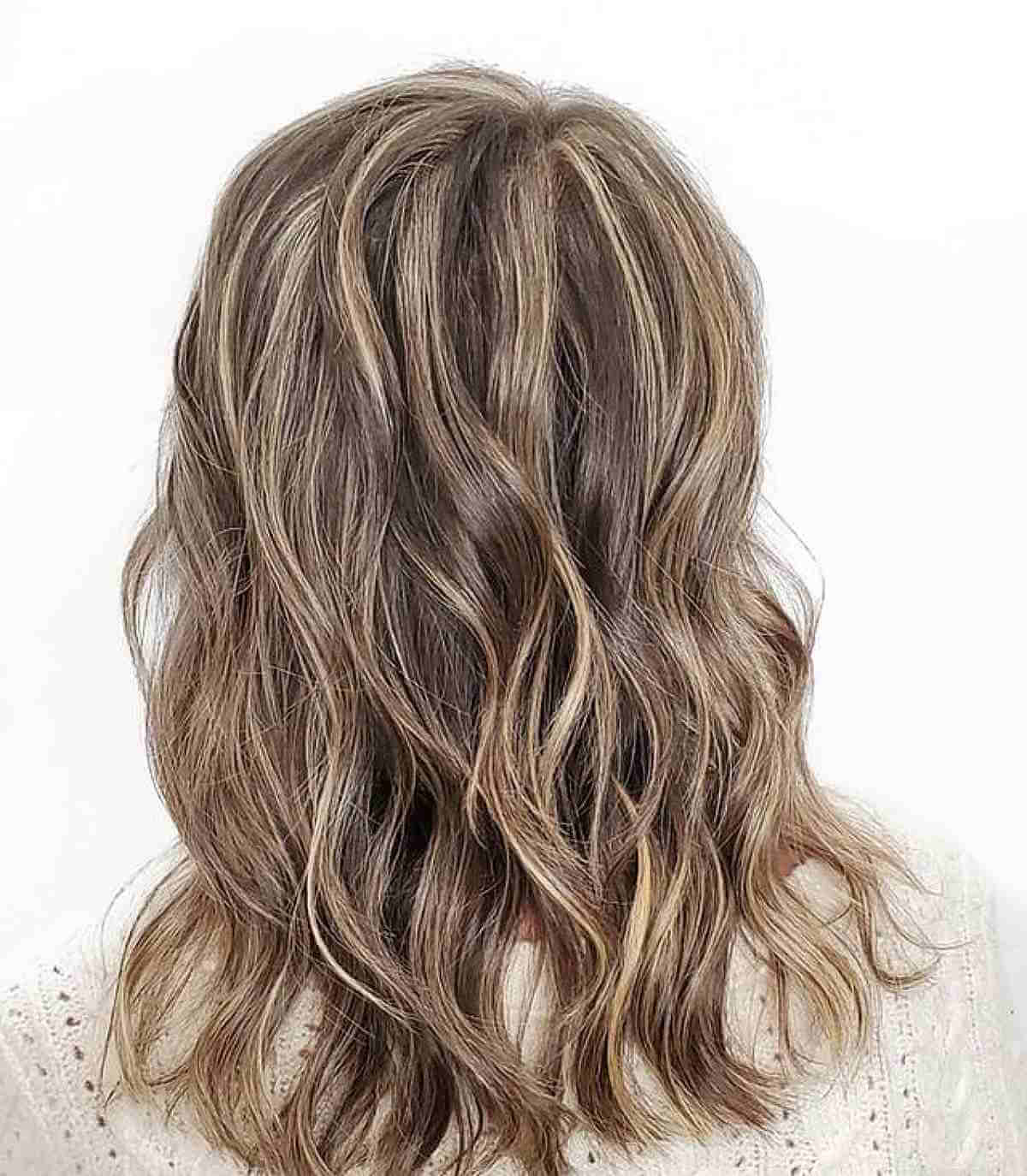 Warm Blonde Highlights on Wavy Brown Hair