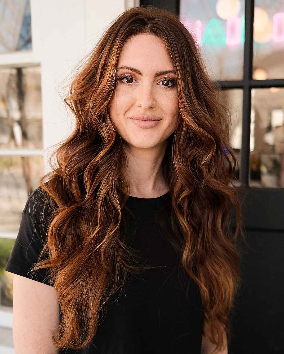 warm toasty brown balayage for long wavy hair